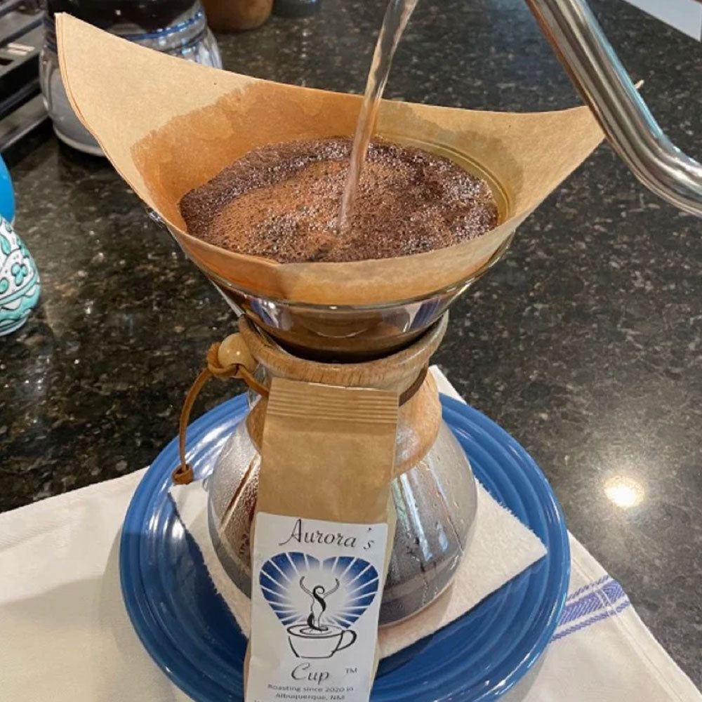 Pour over coffee brewing in a Chemex device by Auroras Cup Coffee
