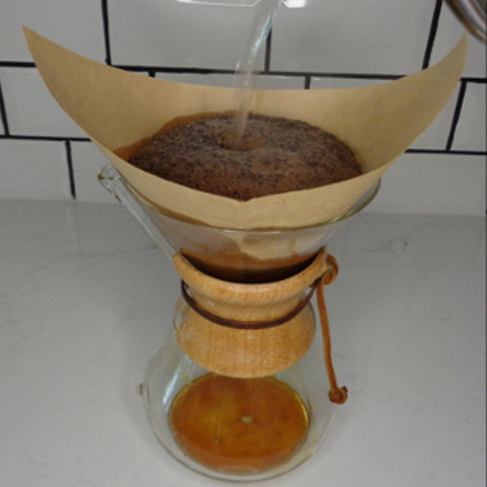 Chemex drip coffee maker brewing Aurora's Cup Coffee