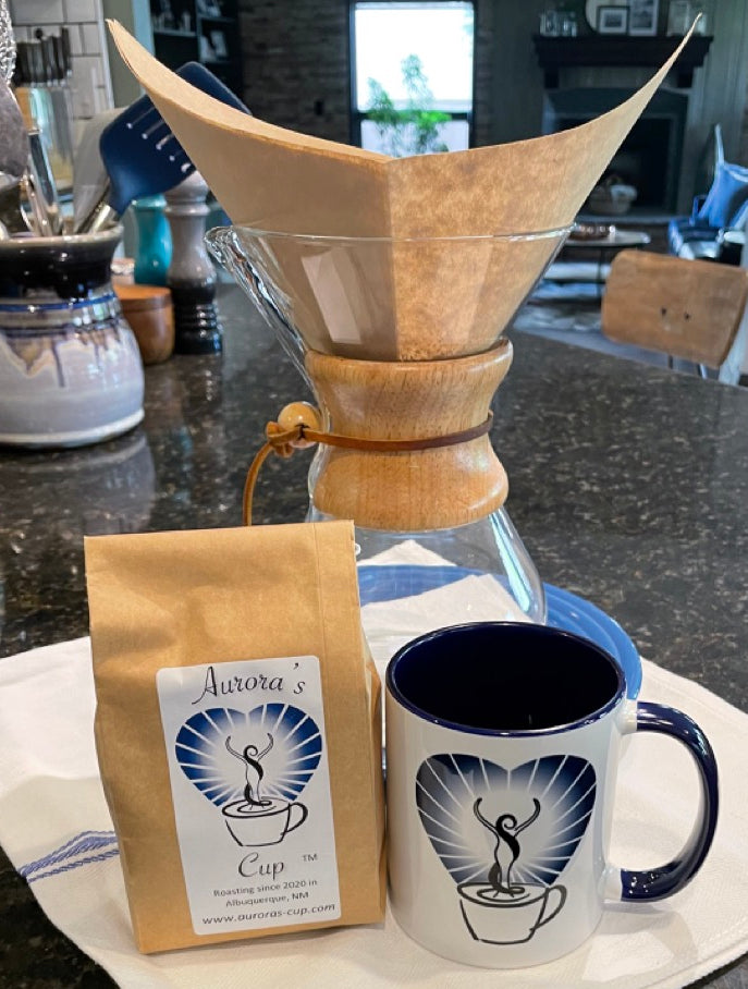 Chemex, an 8oz bag of coffee and an Aurora's Cup Coffee branded mug.